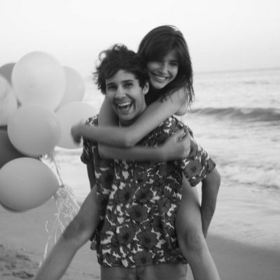 David Dobrik and lady friend - giving piggyback ride.#DavidsPerfume COURTESY OF DAVID’S PERFUME/FLOWER SHOP PERFUMES CO.