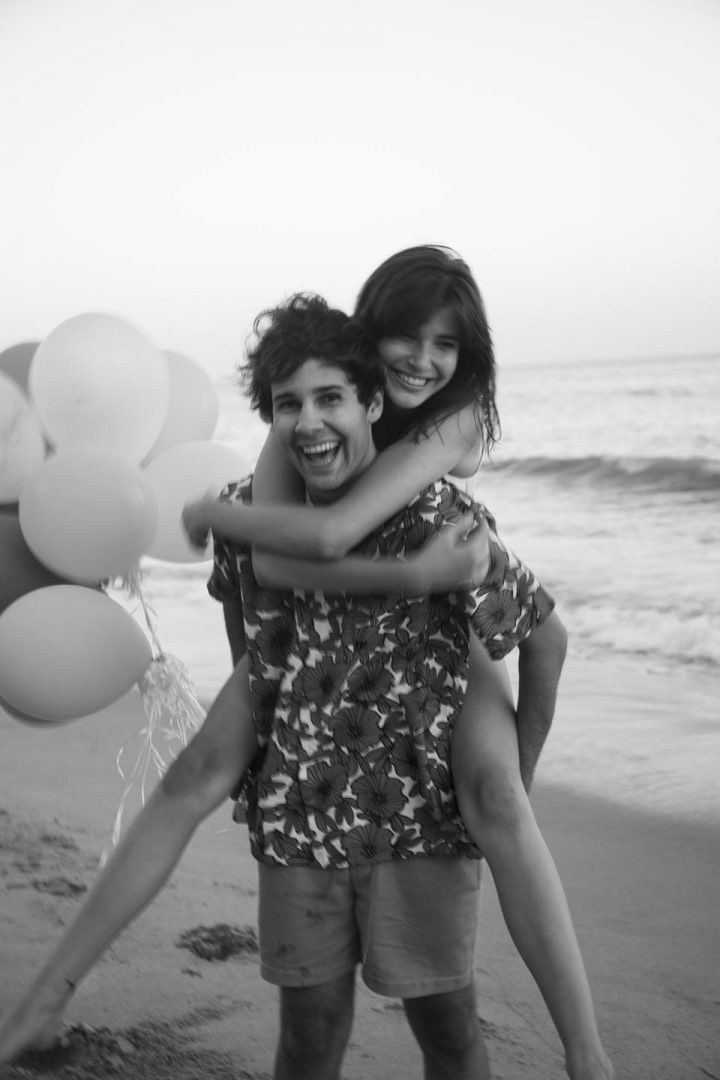 David Dobrik and lady friend - giving piggyback ride.#DavidsPerfume COURTESY OF DAVID’S PERFUME/FLOWER SHOP PERFUMES CO.