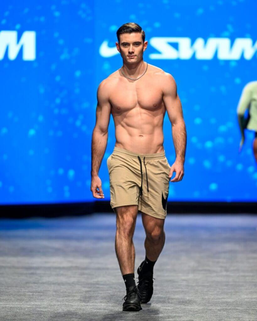 Model in khaki shorts on the runway