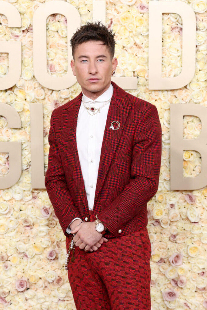 Barry Keoghan in a red suit at an awards event