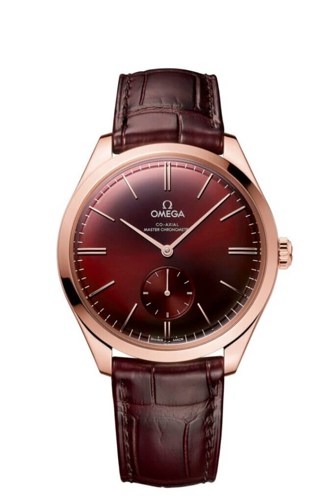 Omega De Ville Prestige watch with a red dial