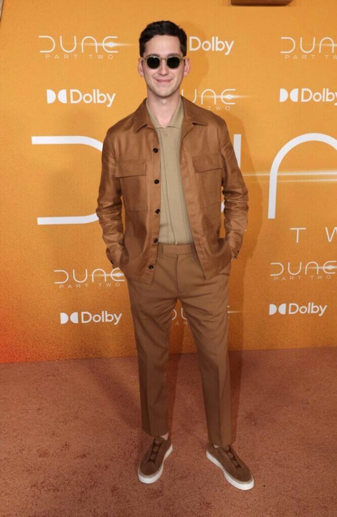 Man in a Zegna rust suit