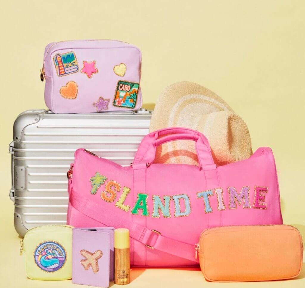 Pink luggage and travel accessories