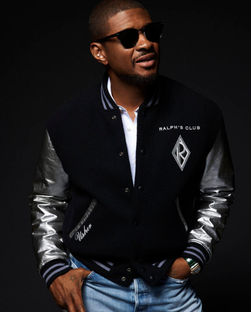 Man in sunglasses and a varsity jacket
