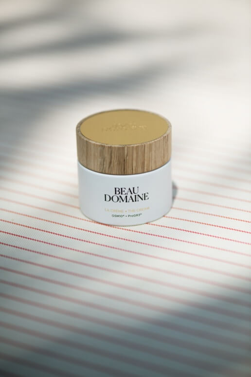 Jar of cream with a wooden lid