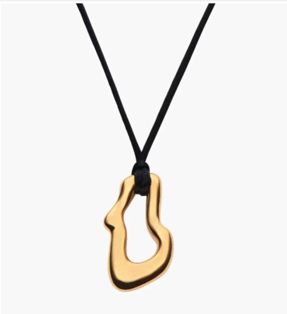 Gold wavy pendant on a black cord